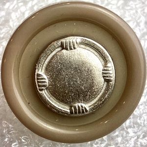 Antique button with loop shank and silver filigree center